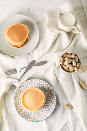 Composition with tasty pancakes on table