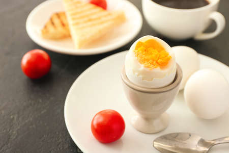 Tasty boiled eggs on tableの写真素材