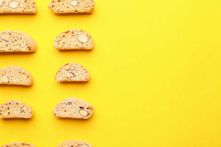 Sweet almond cookies on color backgroundの写真素材