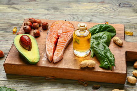 Healthy products rich in omega-3 on wooden backgroundの写真素材