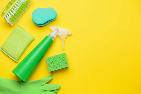 Set of cleaning supplies on color backgroundの写真素材
