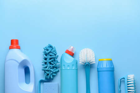 Set of cleaning supplies on color backgroundの写真素材