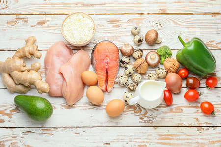Healthy products on white wooden backgroundの写真素材
