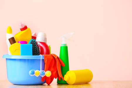 Set of cleaning supplies on color backgroundの写真素材