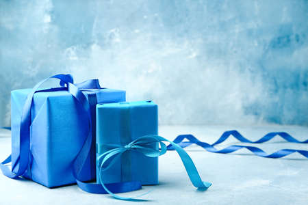 Packed gifts on color background