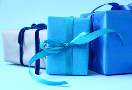 Packed gifts on color backgroundの写真素材