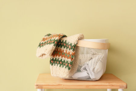 Basket with socks on tableの写真素材