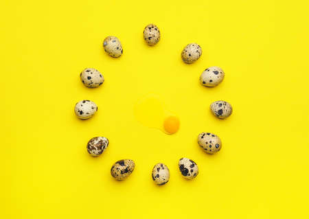 Raw quail eggs on color backgroundの写真素材