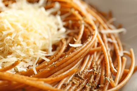 Plate with tasty pasta and cheese, closeupの写真素材