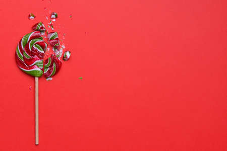 Crushed lollipop on color backgroundの写真素材