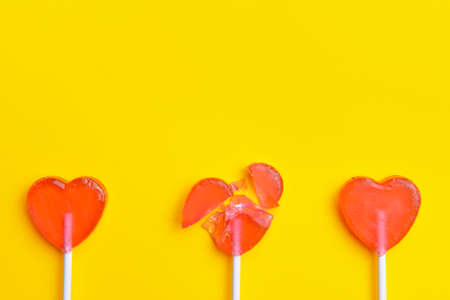 Tasty lollipops on color background