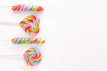 Tasty lollipops on white backgroundの写真素材