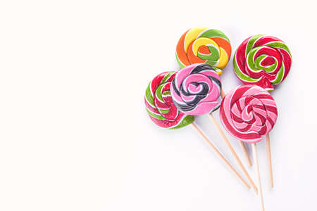 Tasty lollipops on white backgroundの写真素材