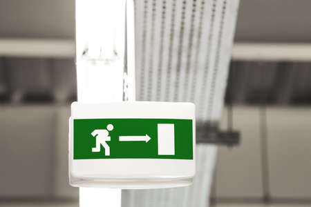 Fire exit sign in buildingの写真素材