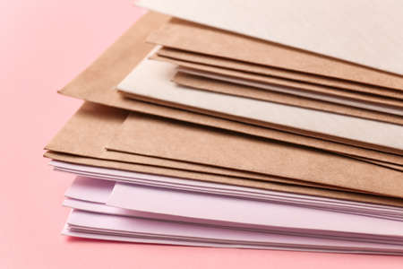 Paper envelopes on color background, closeupの写真素材