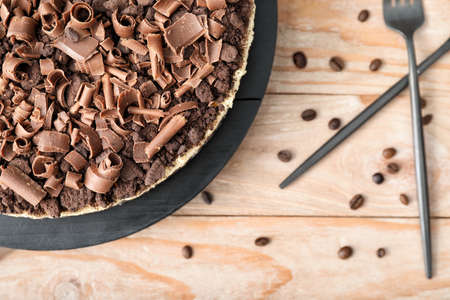 Tasty chocolate cheesecake on wooden tableの写真素材