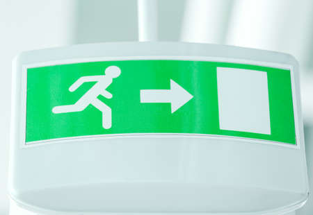 Fire exit sign in buildingの写真素材