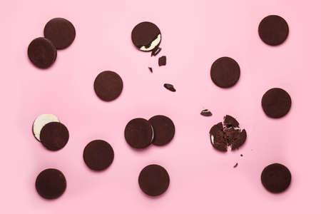 Tasty chocolate cookies on color backgroundの写真素材