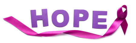 Violet ribbon and word HOPE on white background. Domestic violence conceptの写真素材