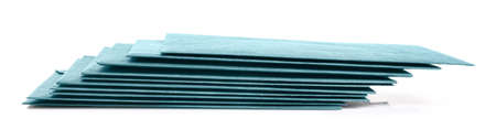 Stack of paper envelopes on white background