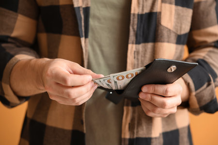 Man with purse and money, closeupの写真素材