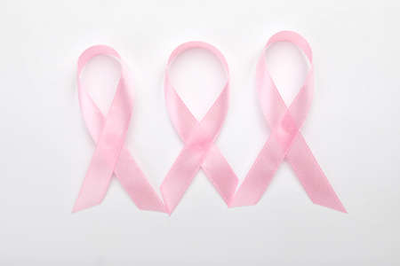 Pink ribbons on white background. Breast cancer awareness conceptの写真素材