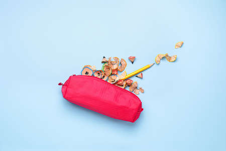 Bag with ordinary pencils on color backgroundの写真素材