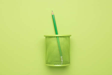 Holder with ordinary pencil on color backgroundの写真素材