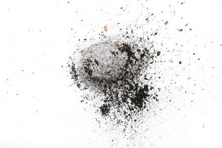 Shavings of graphite pencil on white paperの写真素材