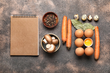 Cook book with products on dark backgroundの写真素材