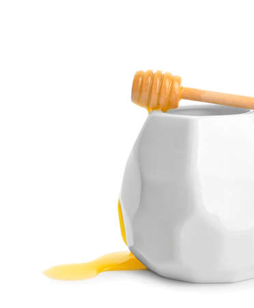 Jar with sweet honey on white backgroundの写真素材