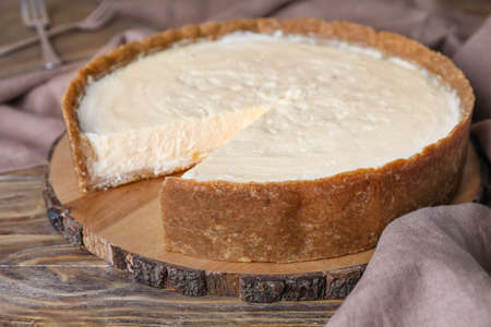 Sweet tasty cheesecake on tableの写真素材