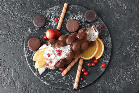 Delicious sweet bubble waffle on dark backgroundの写真素材