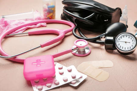 First aid kit on color backgroundの写真素材