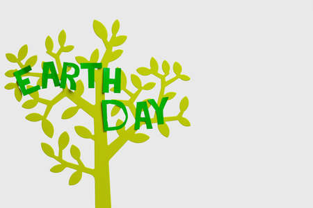 Figure of tree with text EARTH DAY on light backgroundの写真素材