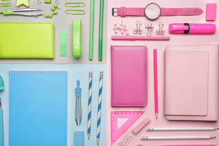 Set of school supplies with clock on color background