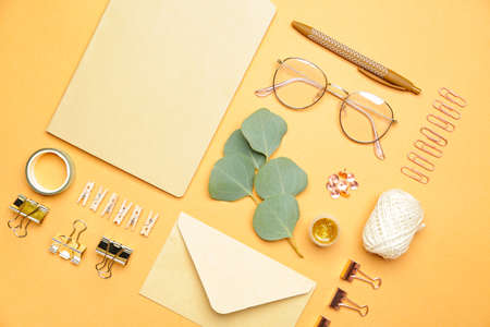 Set of school supplies with eyeglasses on color backgroundの写真素材