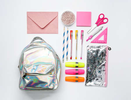Set of school supplies with backpack on white backgroundの写真素材