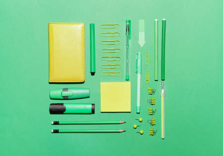 Set of school supplies on color backgroundの写真素材