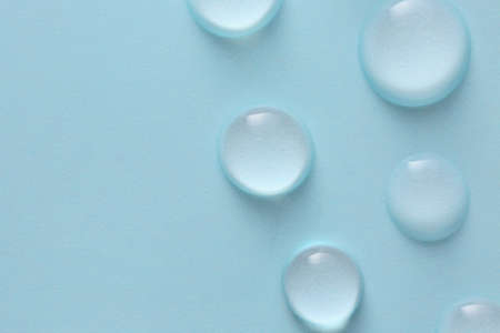 Drops of water on color backgroundの写真素材
