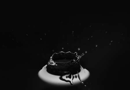 Splash of clean water on dark backgroundの写真素材