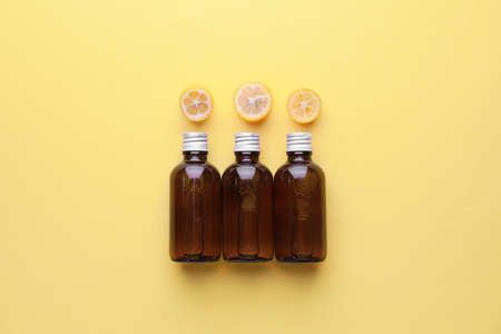 Cosmetic product in bottles on color backgroundの写真素材