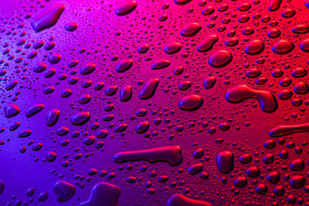 Water drops on color backgroundの写真素材
