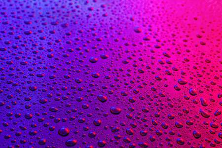 Water drops on color backgroundの写真素材