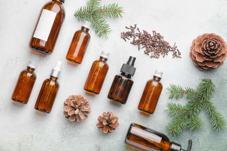 Different cosmetic products in bottles on color backgroundの写真素材