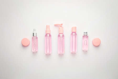 Different cosmetic products on white background