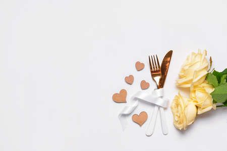 Beautiful table setting for Valentine's Day on white backgroundの写真素材
