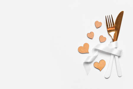 Beautiful table setting for Valentine's Day on white backgroundの写真素材