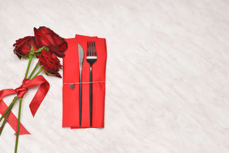 Beautiful table setting for Valentine's Day on light backgroundの写真素材