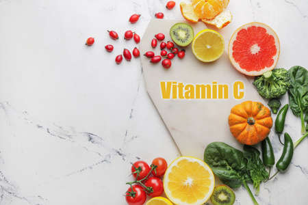 Healthy products rich in vitamin C on white backgroundの写真素材